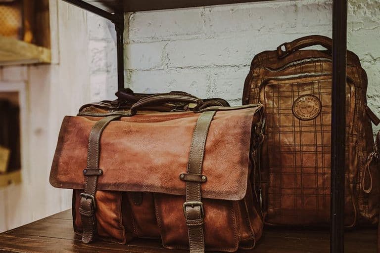 A selection of vintage leather bags on display in a Bengaluru store, showcasing craftsmanship and style.